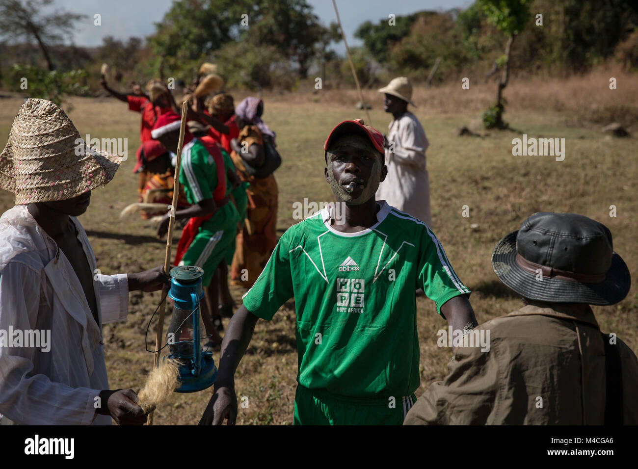 Uganda. 2nd Feb, 2018. Young men and women from the Sebei tribe in Kapchorwa, northeast Uganda, reenact the ceremony they'd go through before circumcision or female genital mutilation (FGM). Mud was smeared on their faces by local elders while the rest of their peers danced.Female genital mutilation (FGM) has been outlawed in Uganda since 2010, but aid workers and police say it's still being practiced by tribes in the northeast, including the Pokots, Sebei, Tepeth and Kadama. Credit: Sally Hayden/SOPA/ZUMA Wire/Alamy Live News Stock Photo