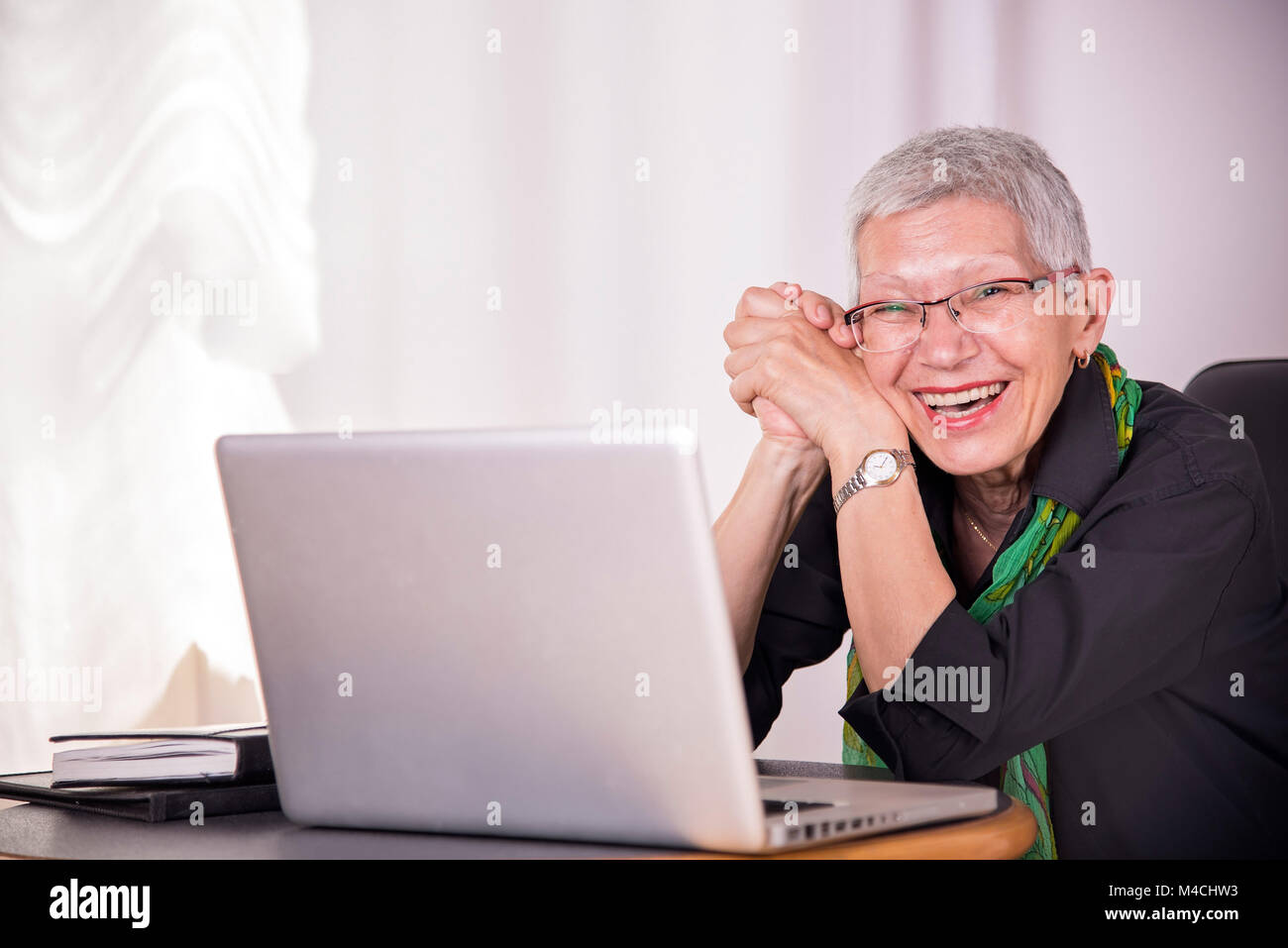 Happy old business woman Stock Photo