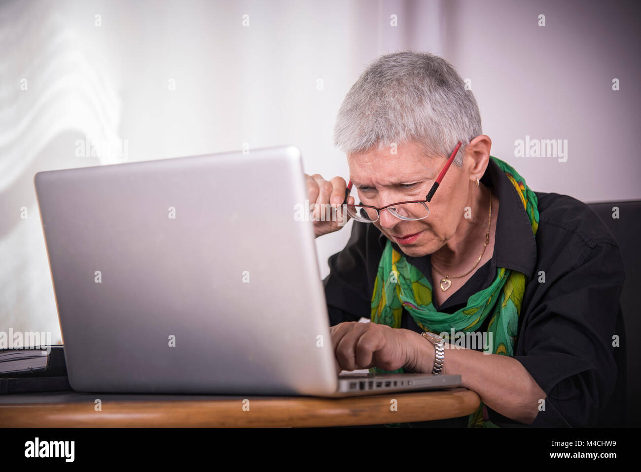 Senior woman, bad eyesight Stock Photo