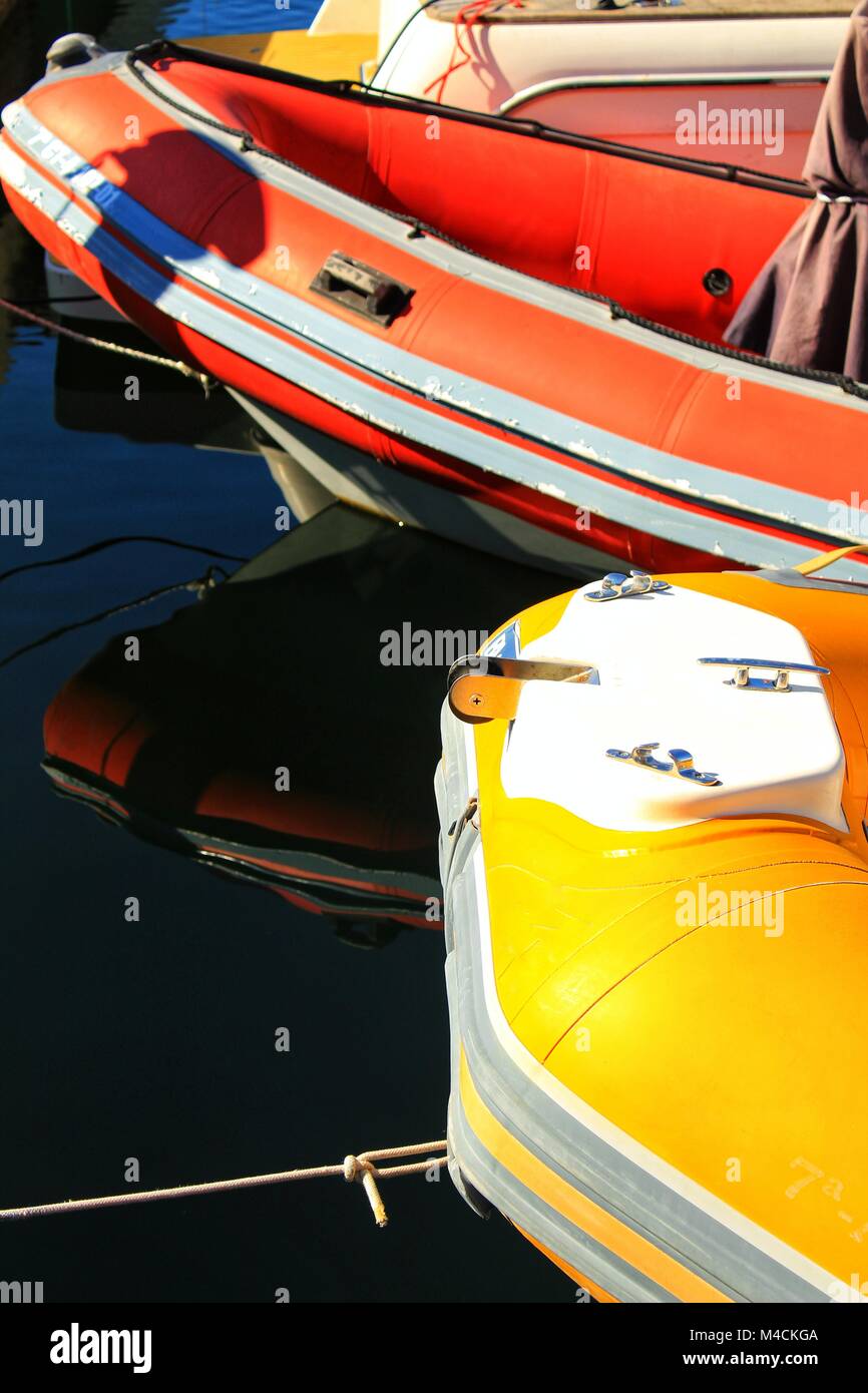 Colorful Recreational boats moored at the dock in the nautical club of ...