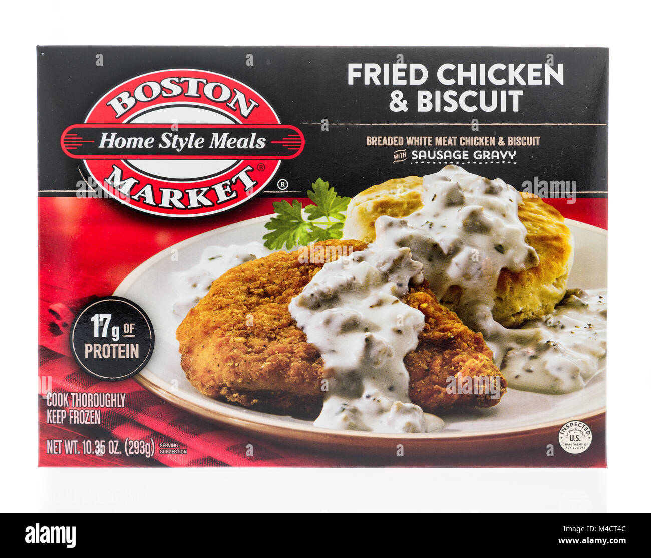 Winneconne, WI - 10 February 2018: A box of Boston Market home style meals in fried chicken and biscuit on an isolated background. Stock Photo