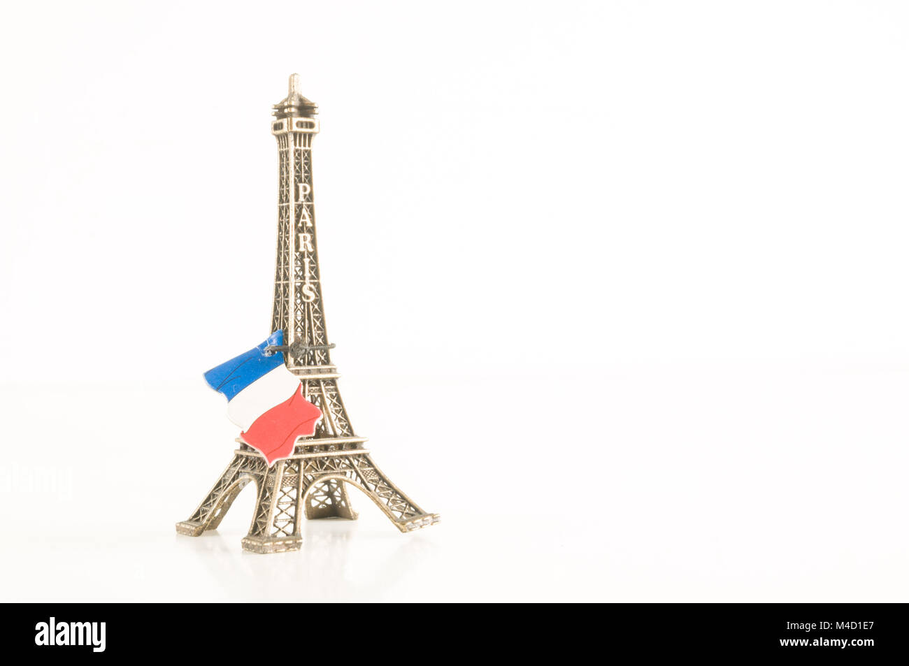 Eiffel Tower toy miniature on white background Stock Photo - Alamy