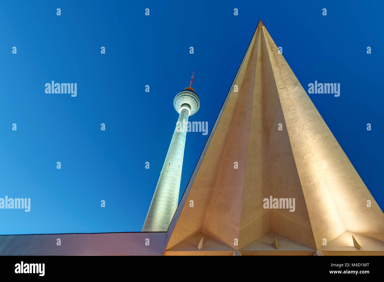 The Famous TV Tower At Alexanderplatz In Berlin At Night Stock Photo the-famous-tv-tower-at-alexanderplatz-in-berlin-at-night-stock-photo