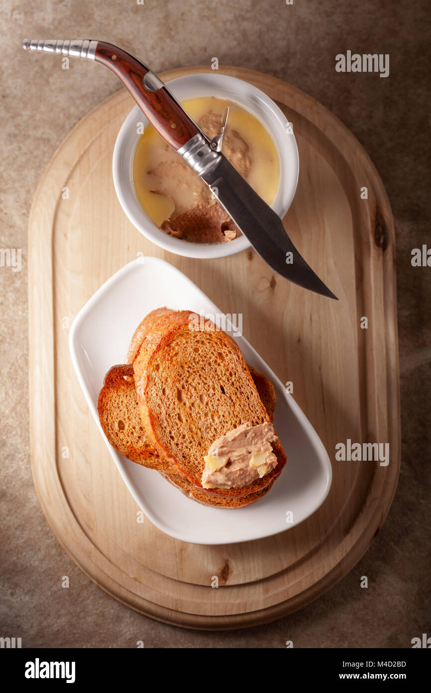 Home made chicken liver pate served with fried bread Stock Photo Alamy
