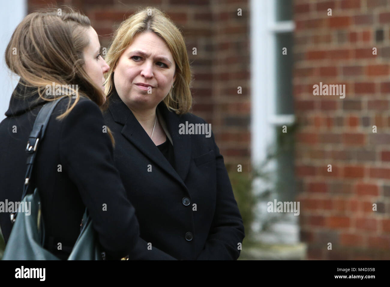 Northern Ireland Secretary of State Karen Bradley greets the British Prime Minister Theresa May at Stormont House,  Belfast, Monday, Feb 12th, 2018. Britain's Prime Minister Theresa May and Irish Prime Minister Leo Varadkar are to visit Belfast later for talks with the Stormont parties. It comes amid speculation the DUP and Sinn Féin are close to agreeing a deal to restore devolved government. Stock Photo