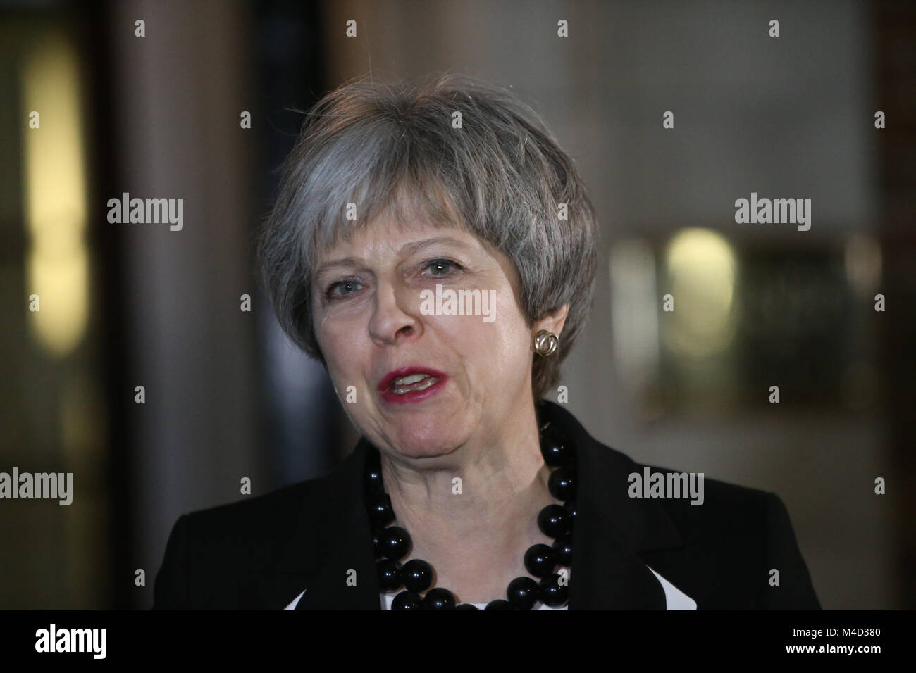 British Prime Minister Theresa May speaks to the media at Stormont,  Belfast, Monday, Feb 12th, 2018. Britain's Prime Minister Theresa May and Irish Prime Minister Leo Varadkar are to visit Belfast later for talks with the Stormont parties. The Prime Ministers left without a deal to restore devolved government. Photo/Paul McErlane Stock Photo