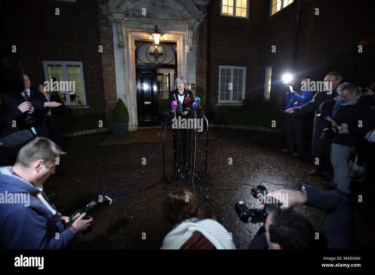 British Prime Minister Theresa May speaks to the media at Stormont,  Belfast, Monday, Feb 12th, 2018. Britain's Prime Minister Theresa May and Irish Prime Minister Leo Varadkar are to visit Belfast later for talks with the Stormont parties. The Prime Ministers left without a deal to restore devolved government. Stock Photo