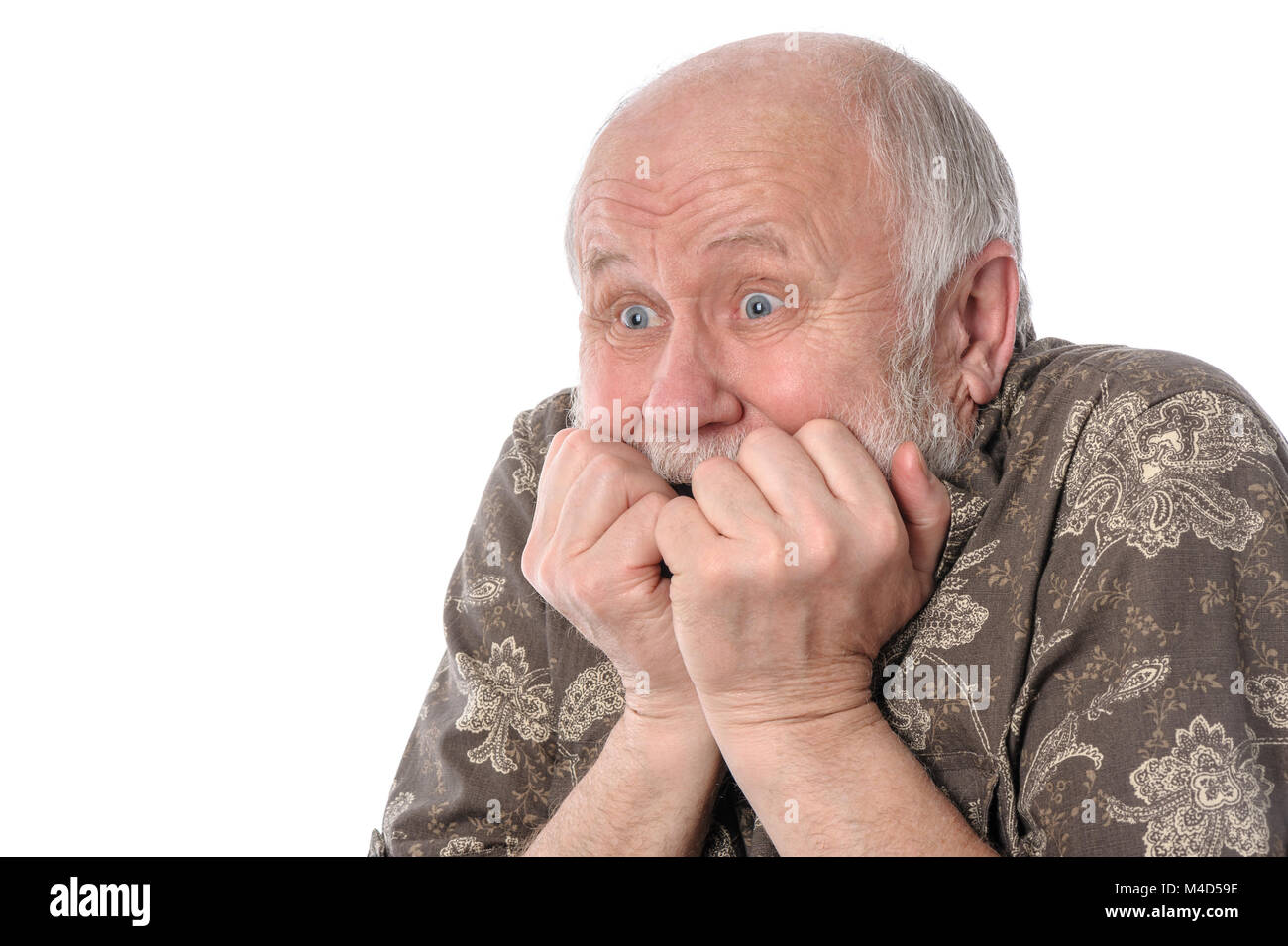 Senior man with grimace of fear, isolated on white Stock Photo