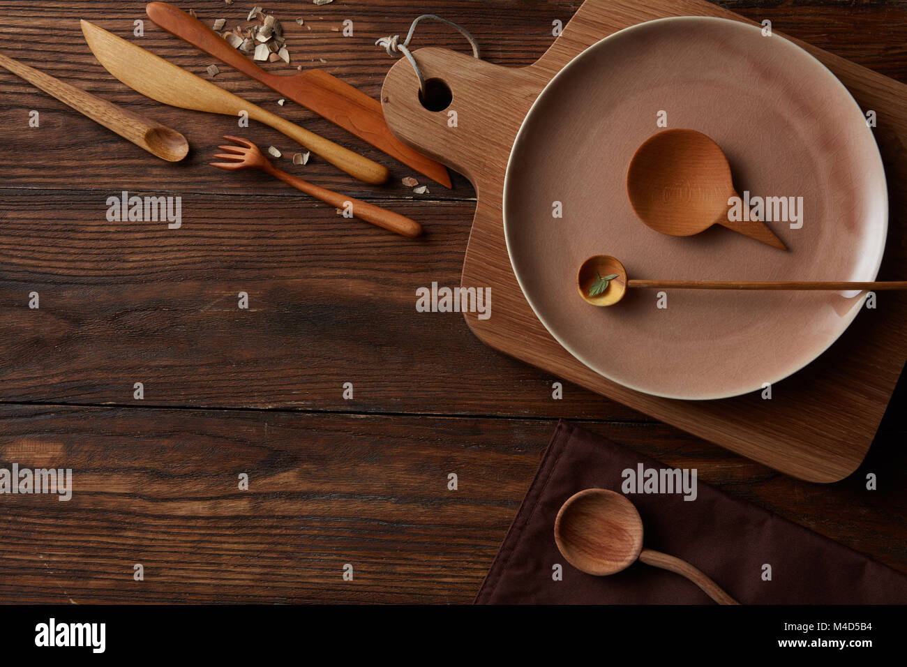 Rural vintage wood kitchen table with cooking utensils around Stock ...
