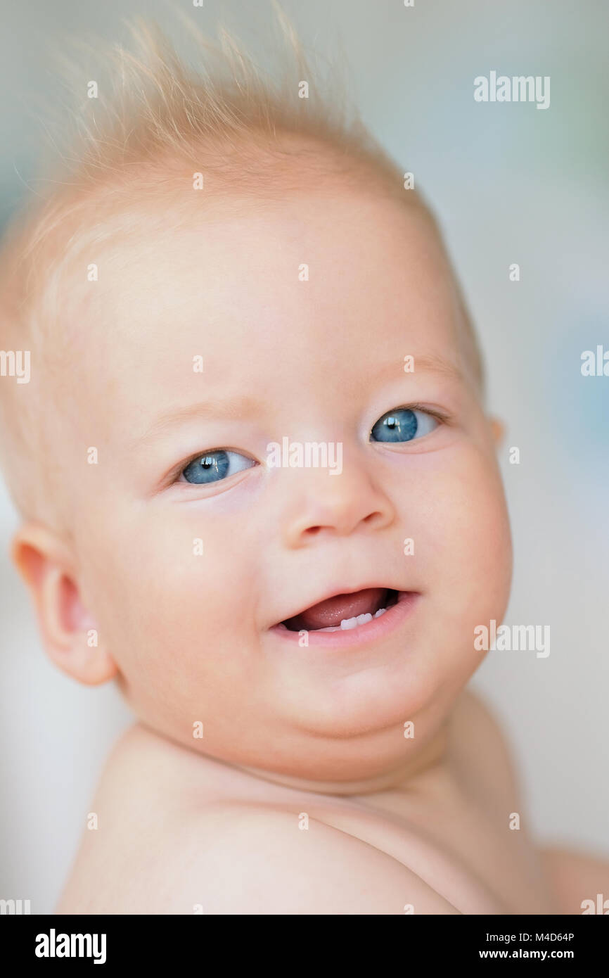 Baby boy with blue eyes Stock Photo Alamy