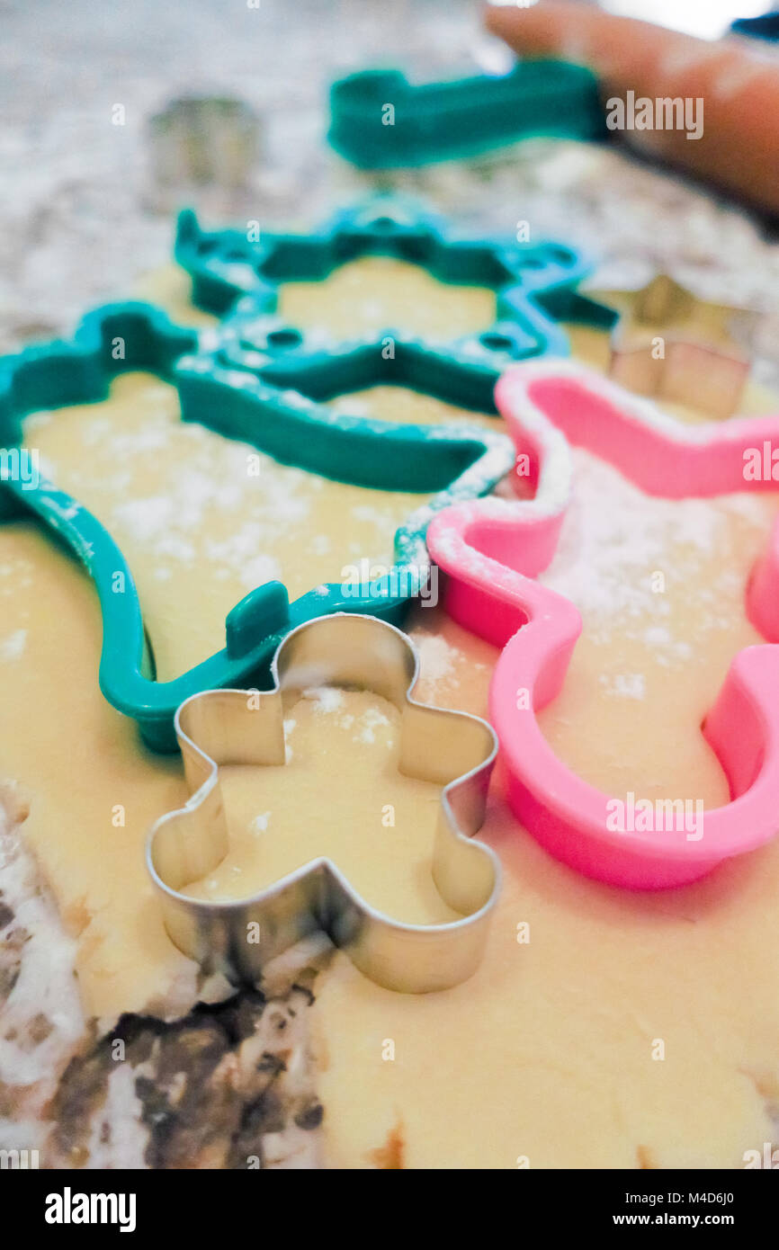 Stuck Gingerbread A little metal gingerbread man cookie cutter stuck in rolled out sugar ...