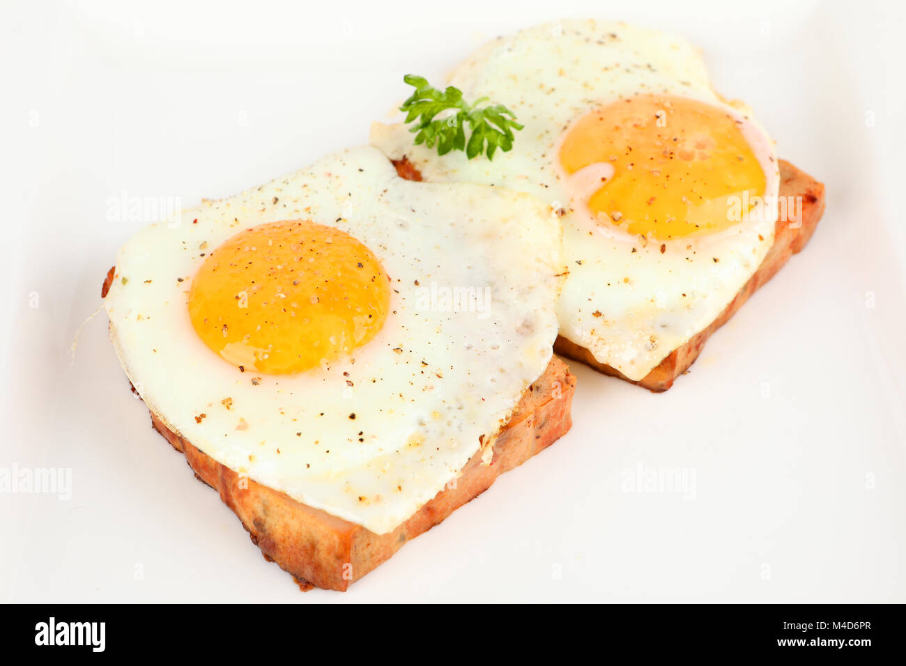 meatloaf with fried eggs Stock Photo Alamy
