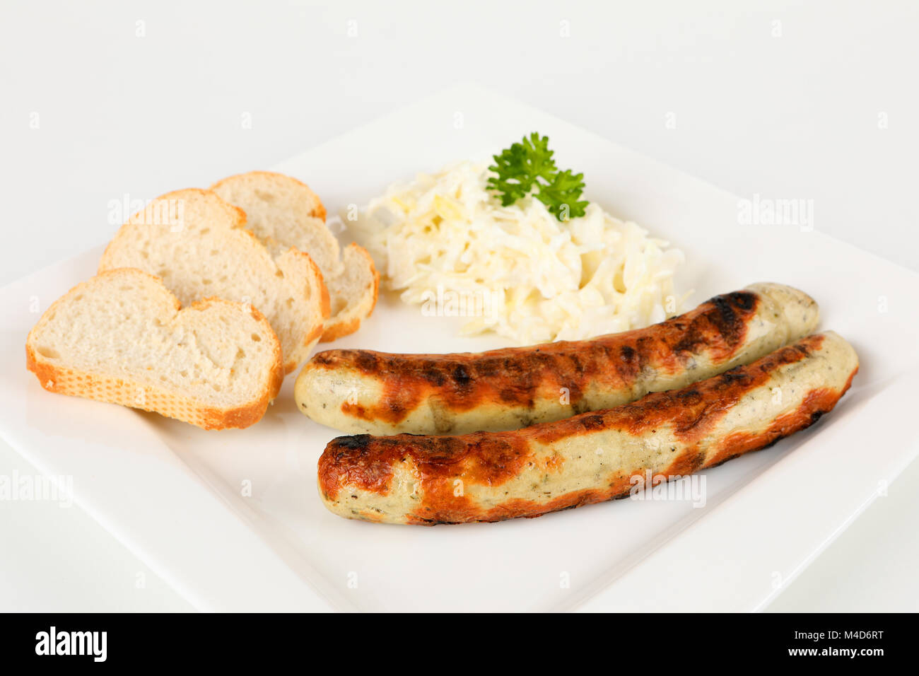 grilled sausages with bread and coleslaw Stock Photo Alamy