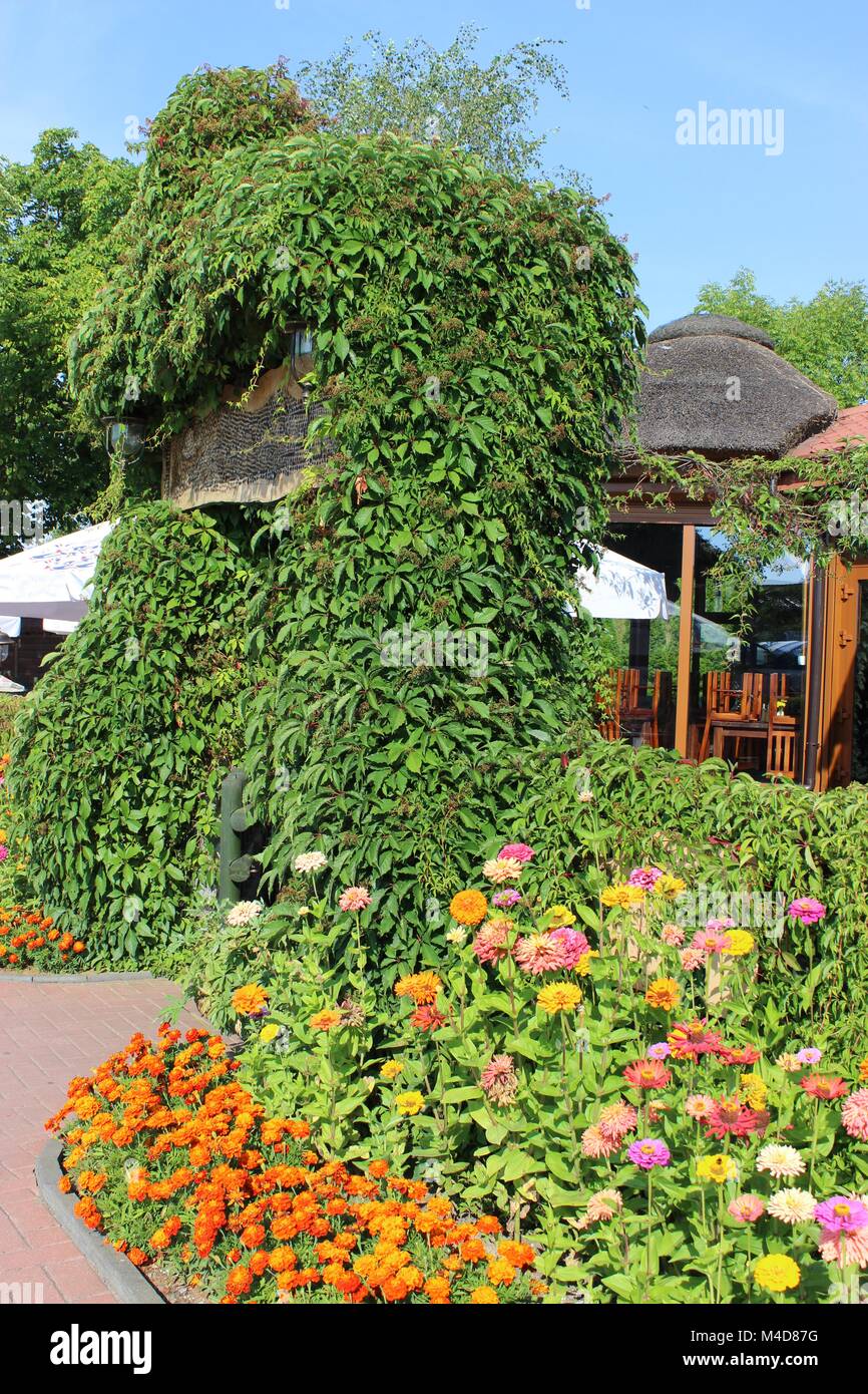 Flower oasis at the roadside Stock Photo Alamy