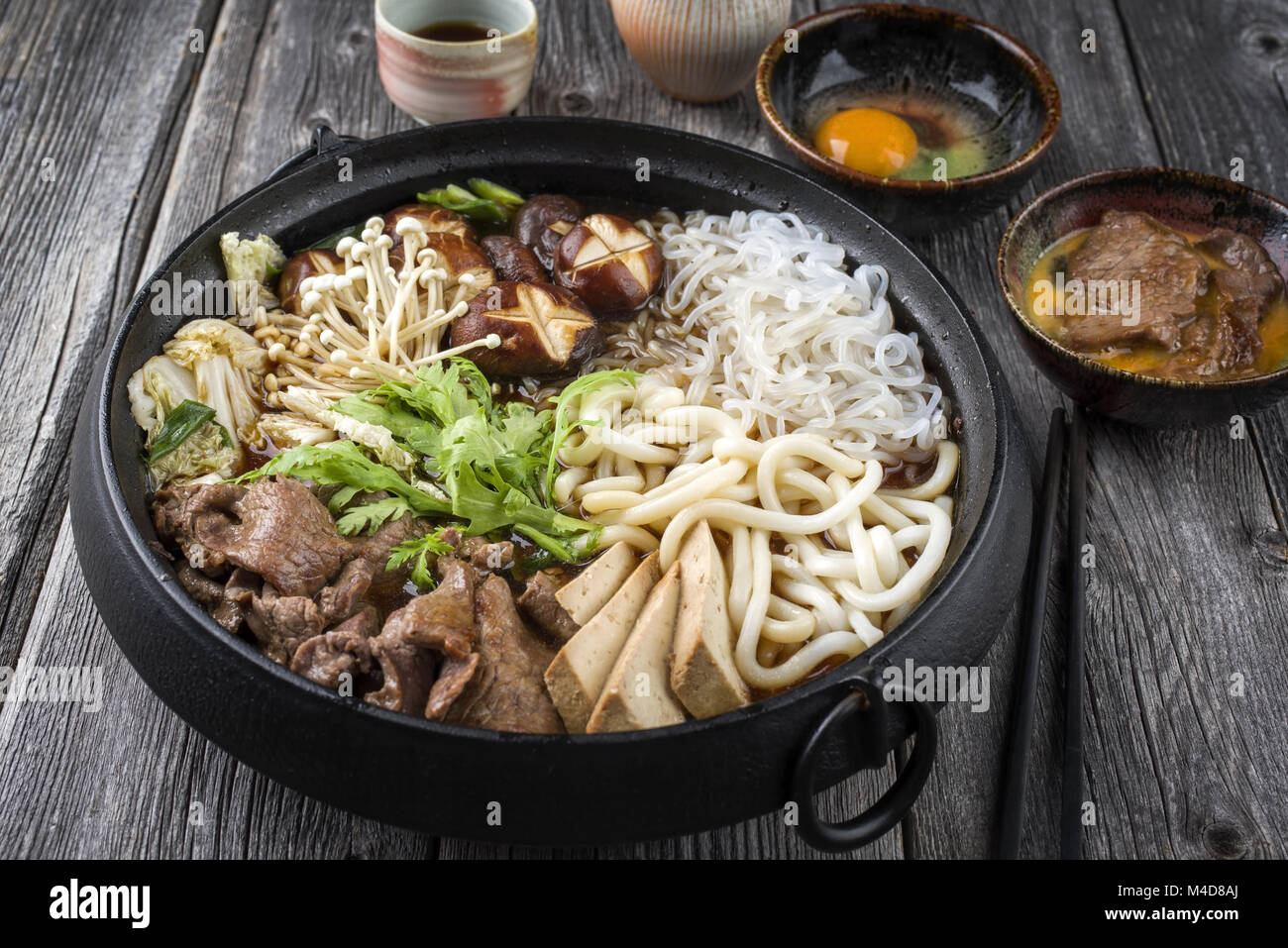 Sukiyaki in traditional Japanese Cast Iron Pot Stock Photo - Alamy