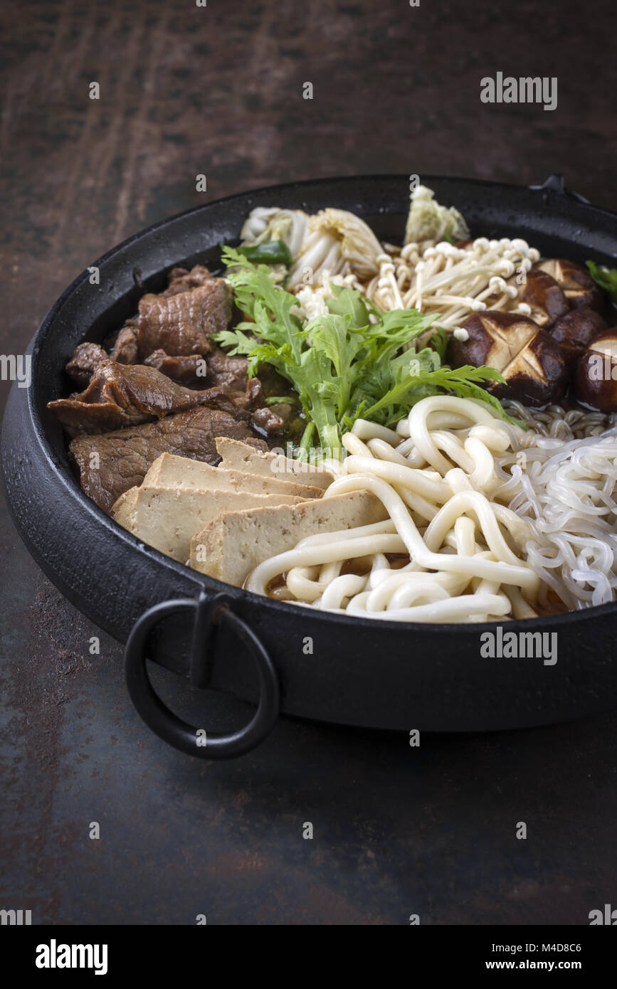 Sukiyaki in traditional Japanese Cast Iron Pot Stock Photo Alamy