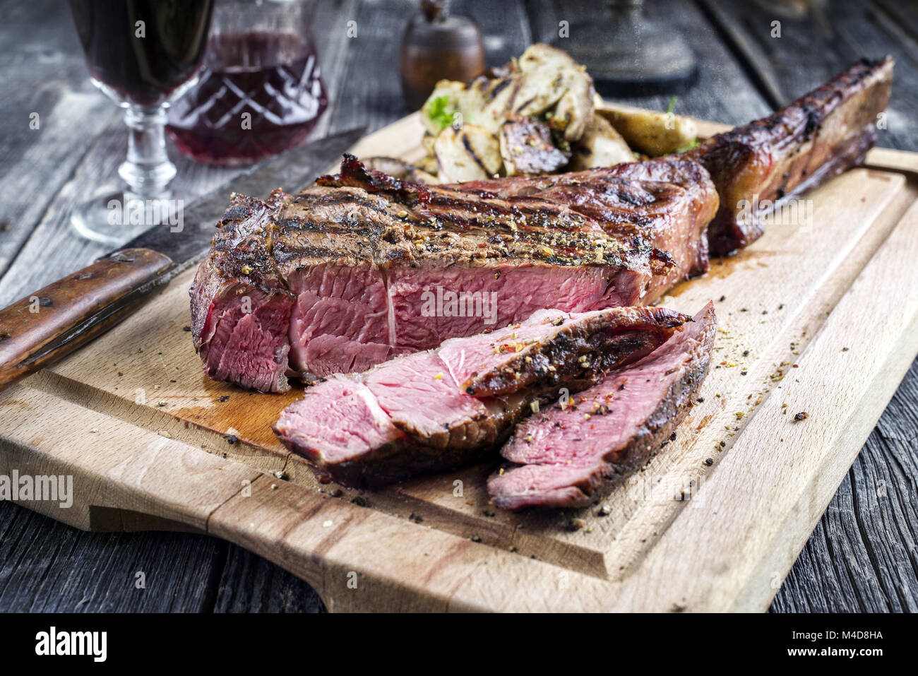 Barbecue Tomahawk Steak on Cutting Board Stock Photo - Alamy
