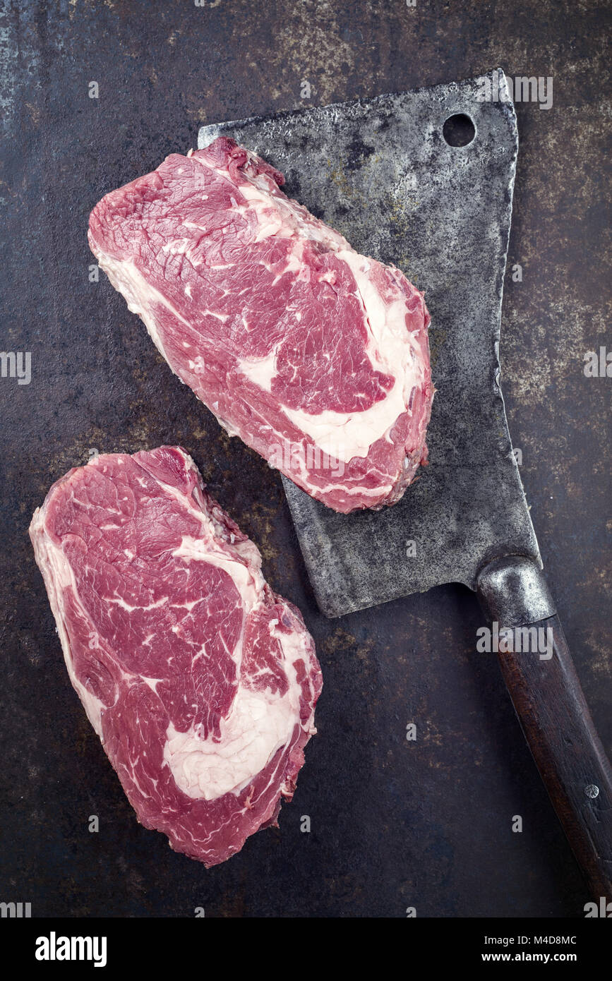 Dry Aged Rib Eye Steak on old Metall Sheet Stock