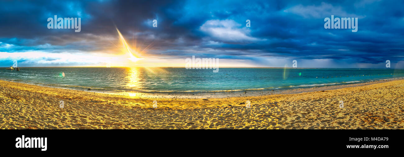 Flic en Flac beach at sunset. Panorama Stock Photo