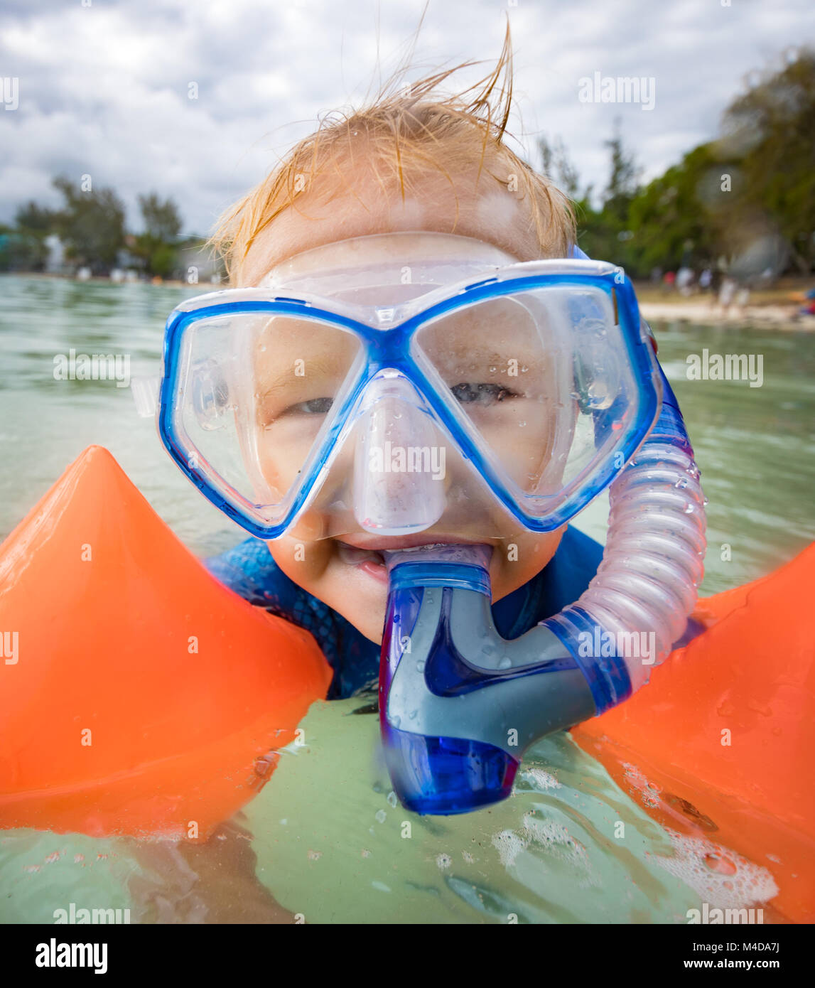 Boy snorkel armbands hires stock photography and images Alamy
