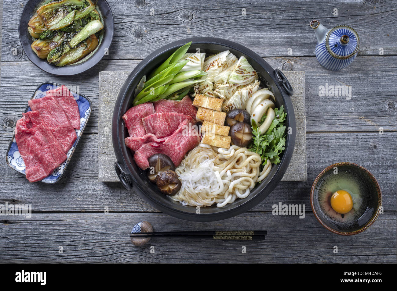 Japanese Sukiyaki in traditional Casr Iron Pot Stock Photo Alamy