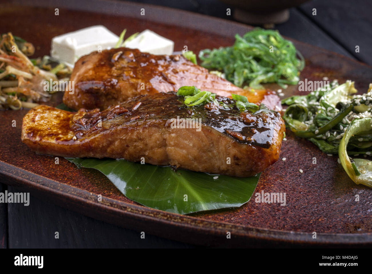 Salmon Teriyaki with Vegetable on Tray Stock Photo