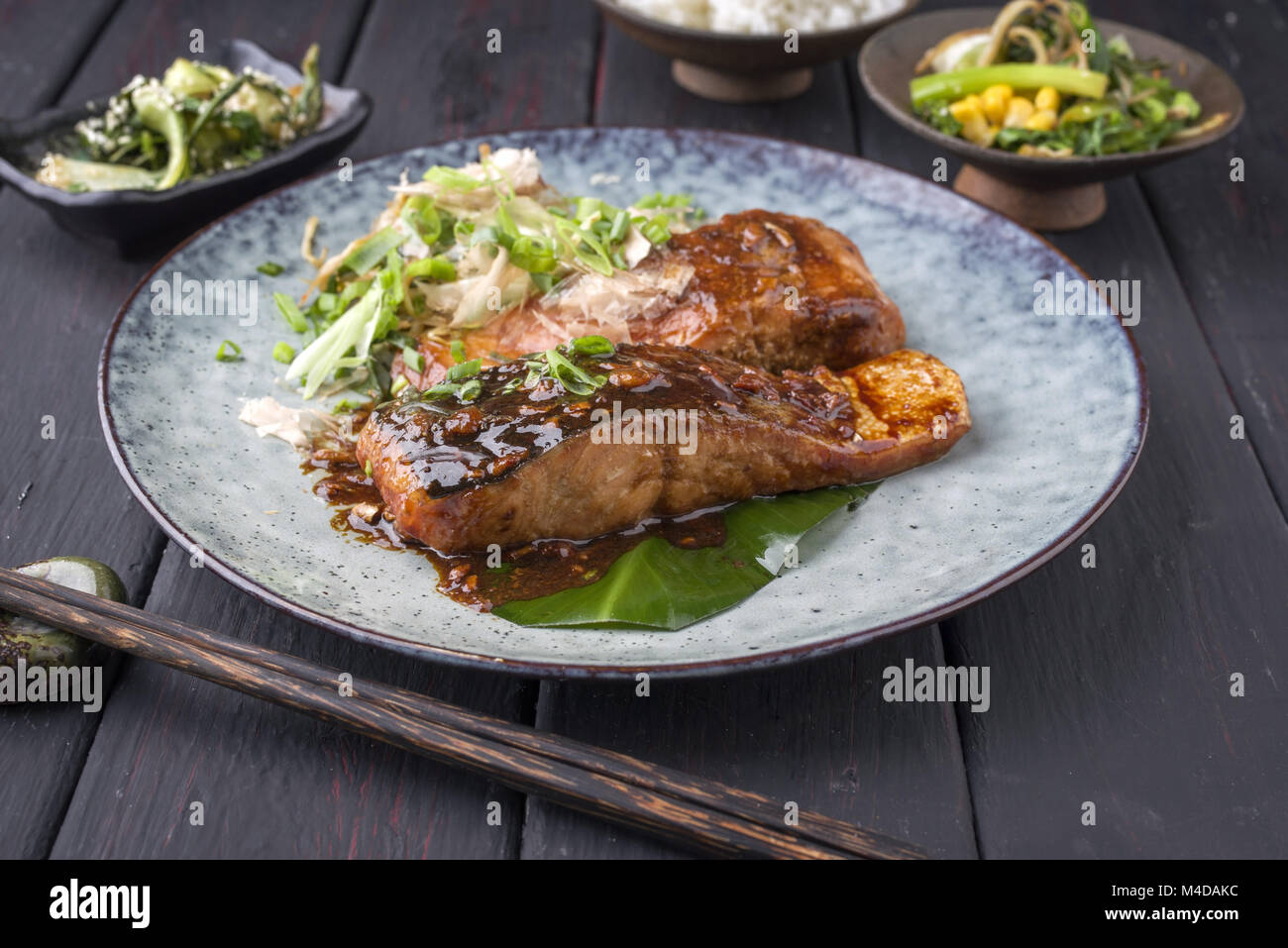 Salmon Teriyaki with Vegetable on Plate Stock Photo