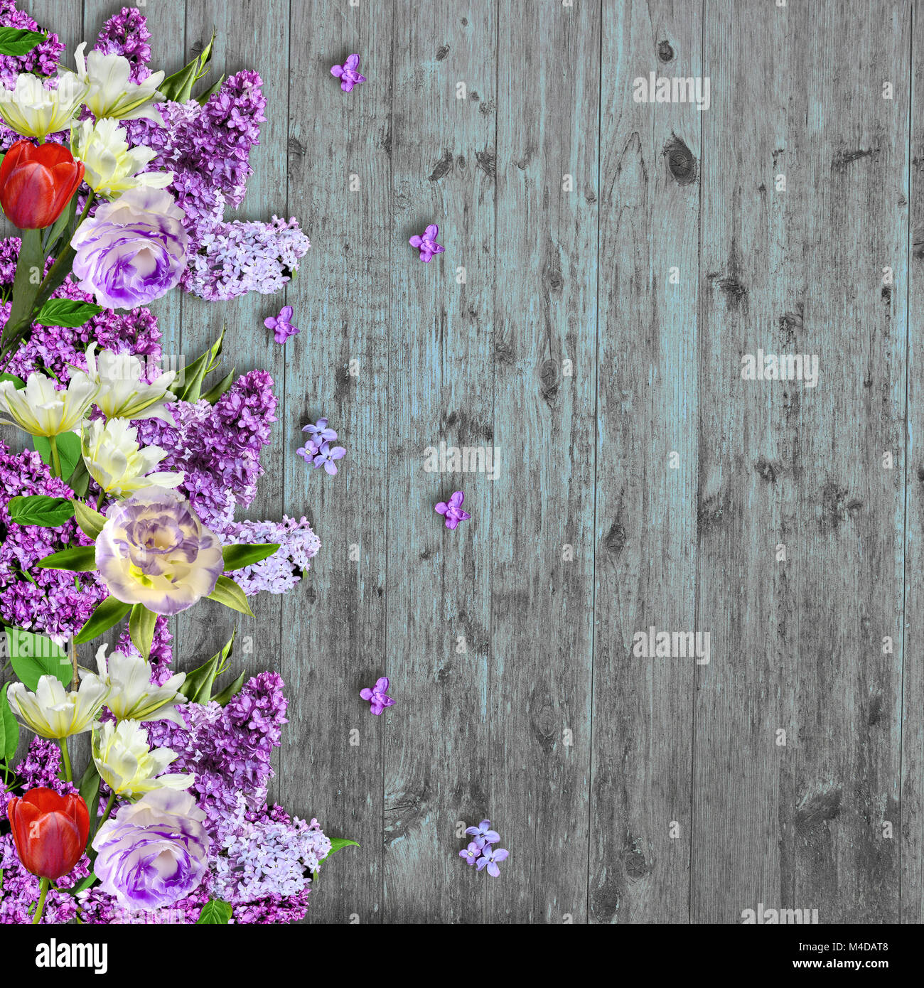 Spring flowers border on vintage wooden background Stock Photo