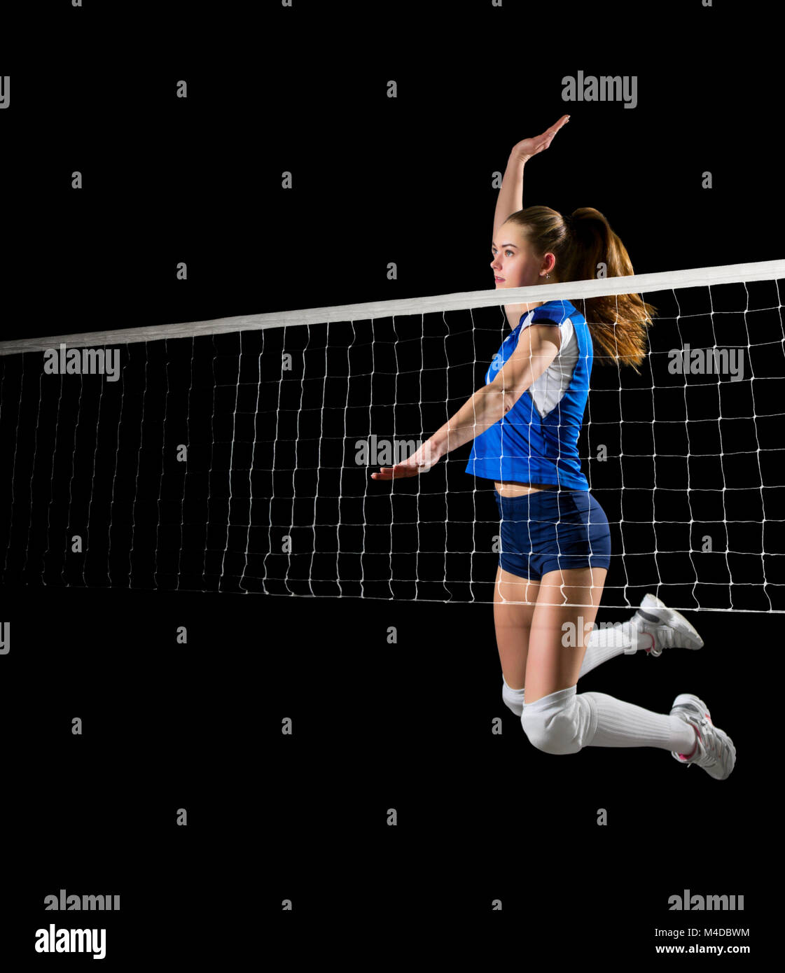 Young girl volleyball player isolated Stock Photo - Alamy