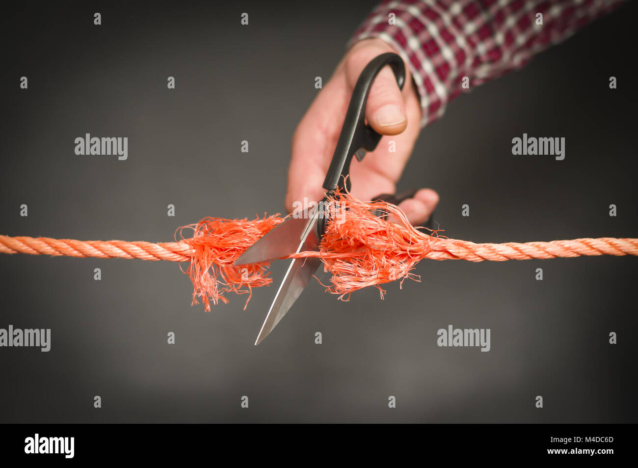Cutting A Rope Stock Photo - Download Image Now - Rope, Cutting