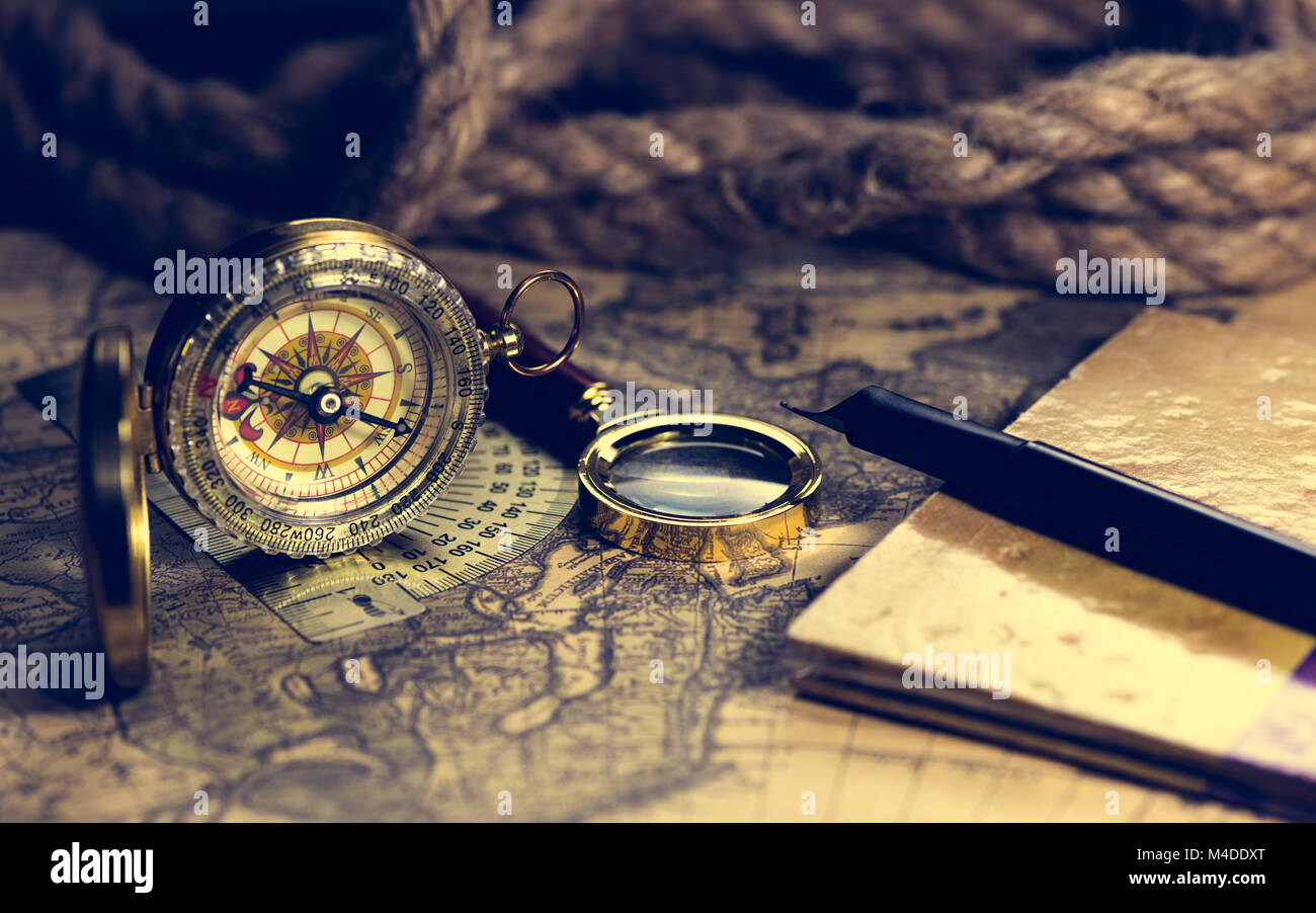 compass and magnifying glass Stock Photo Alamy