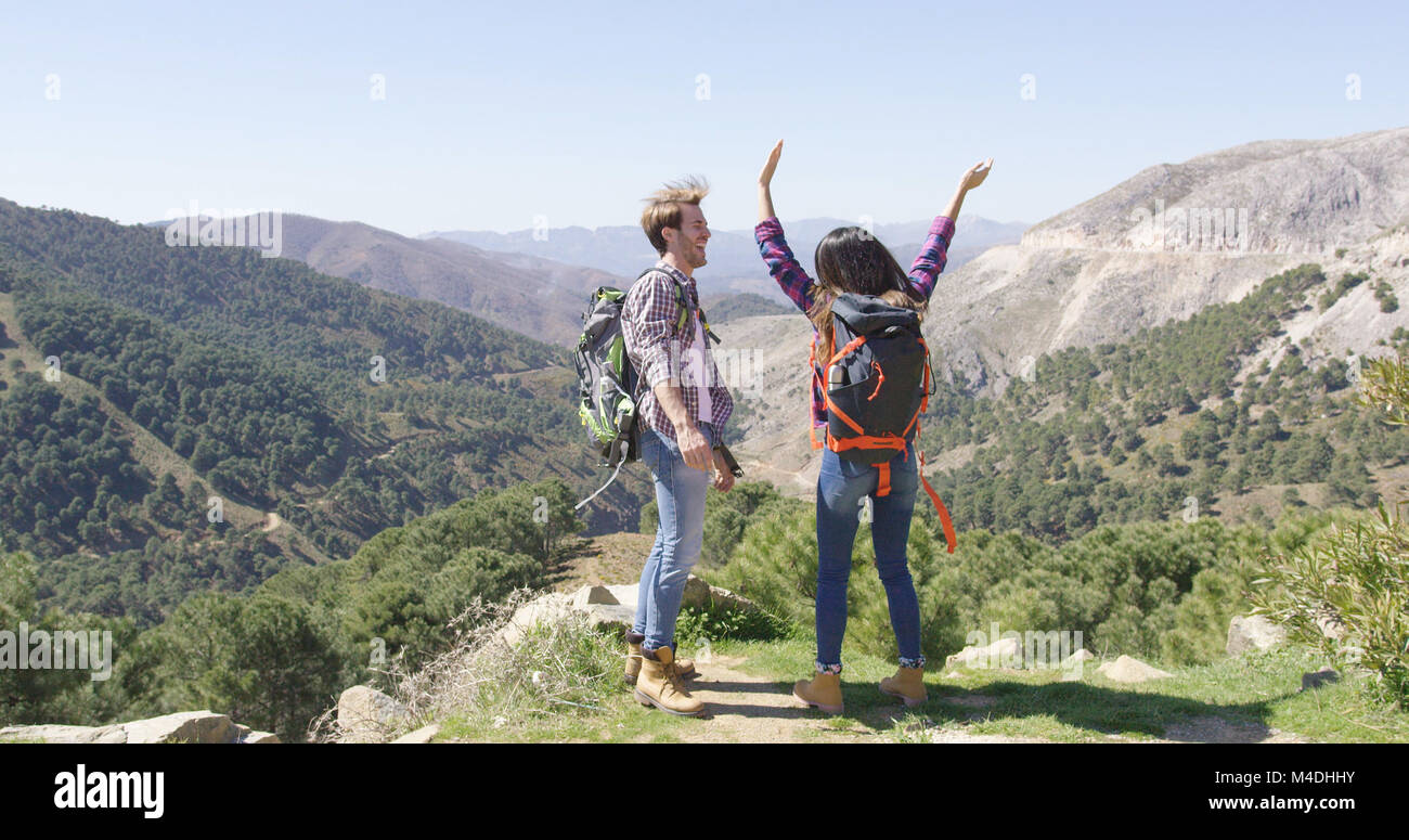 Back view happy successful hi-res stock photography and images - Alamy