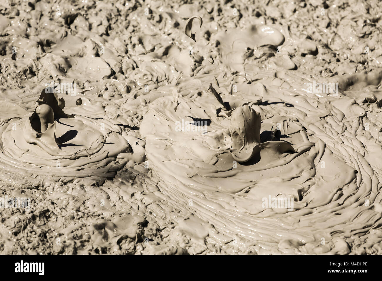 Bubbling mudhole in volcanic area Stock Photo
