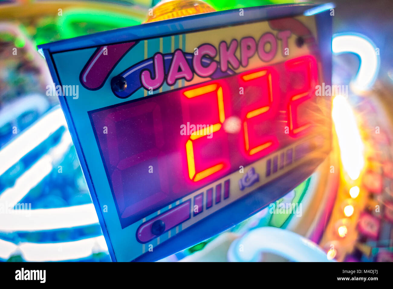 arcade video games and lights and spinning wheels Stock Photo Alamy