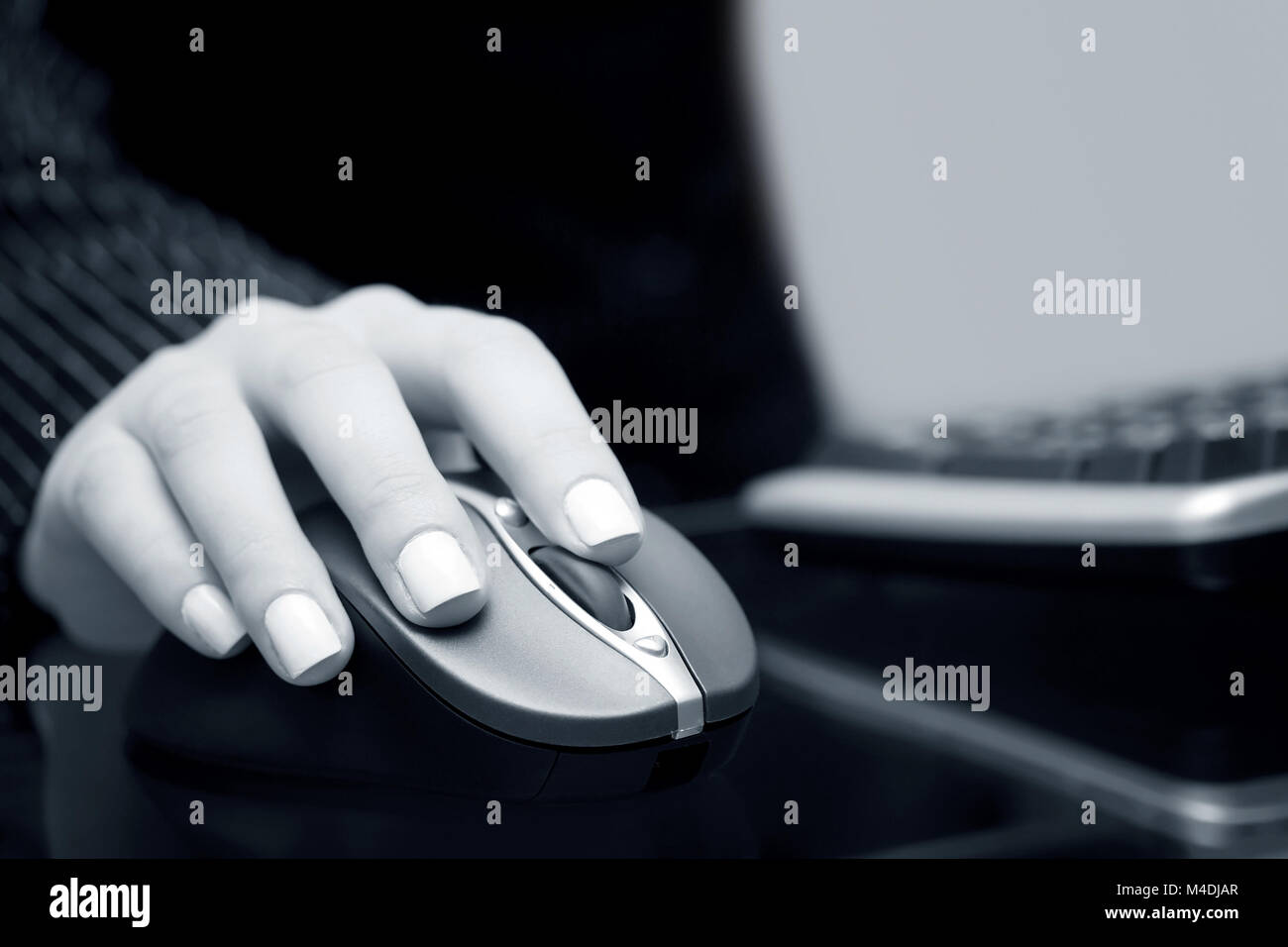 Female hand using computer mouse Stock Photo - Alamy