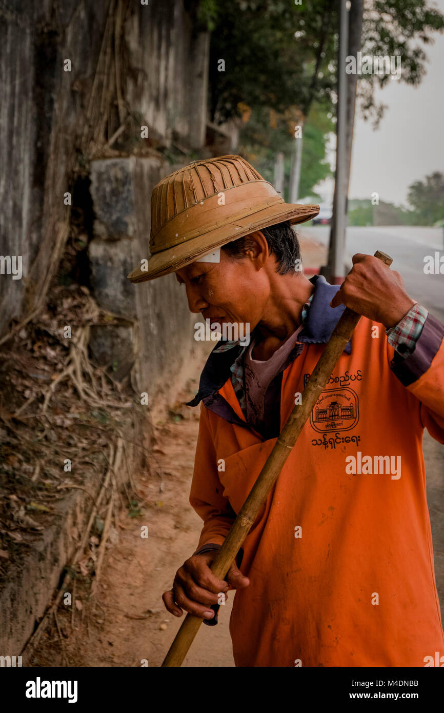 Road sweeper in Yangon Myanmar Stock Photo