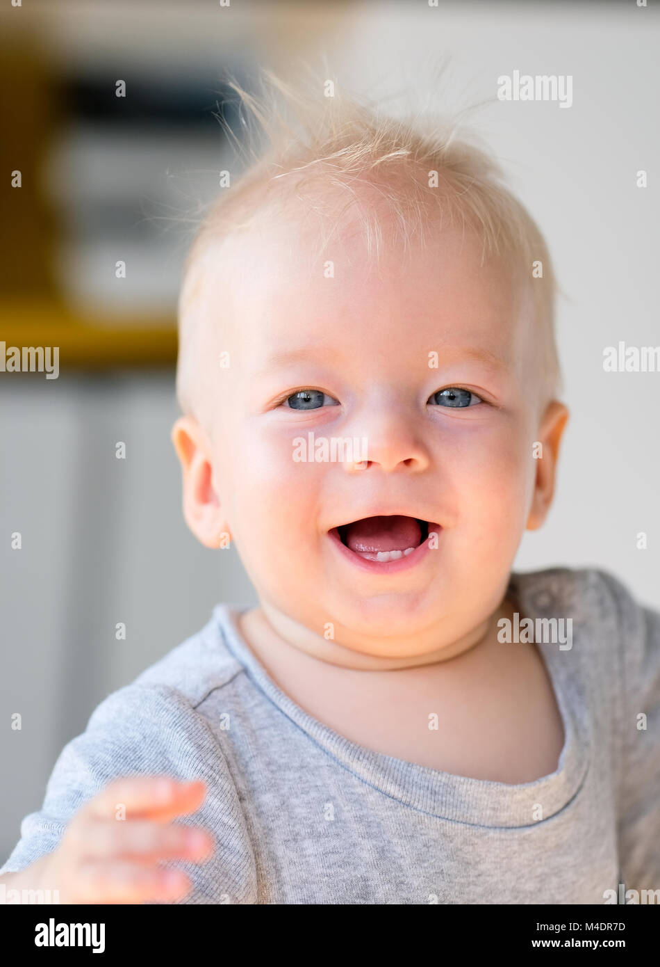 Baby boy with blue eyes Stock Photo Alamy