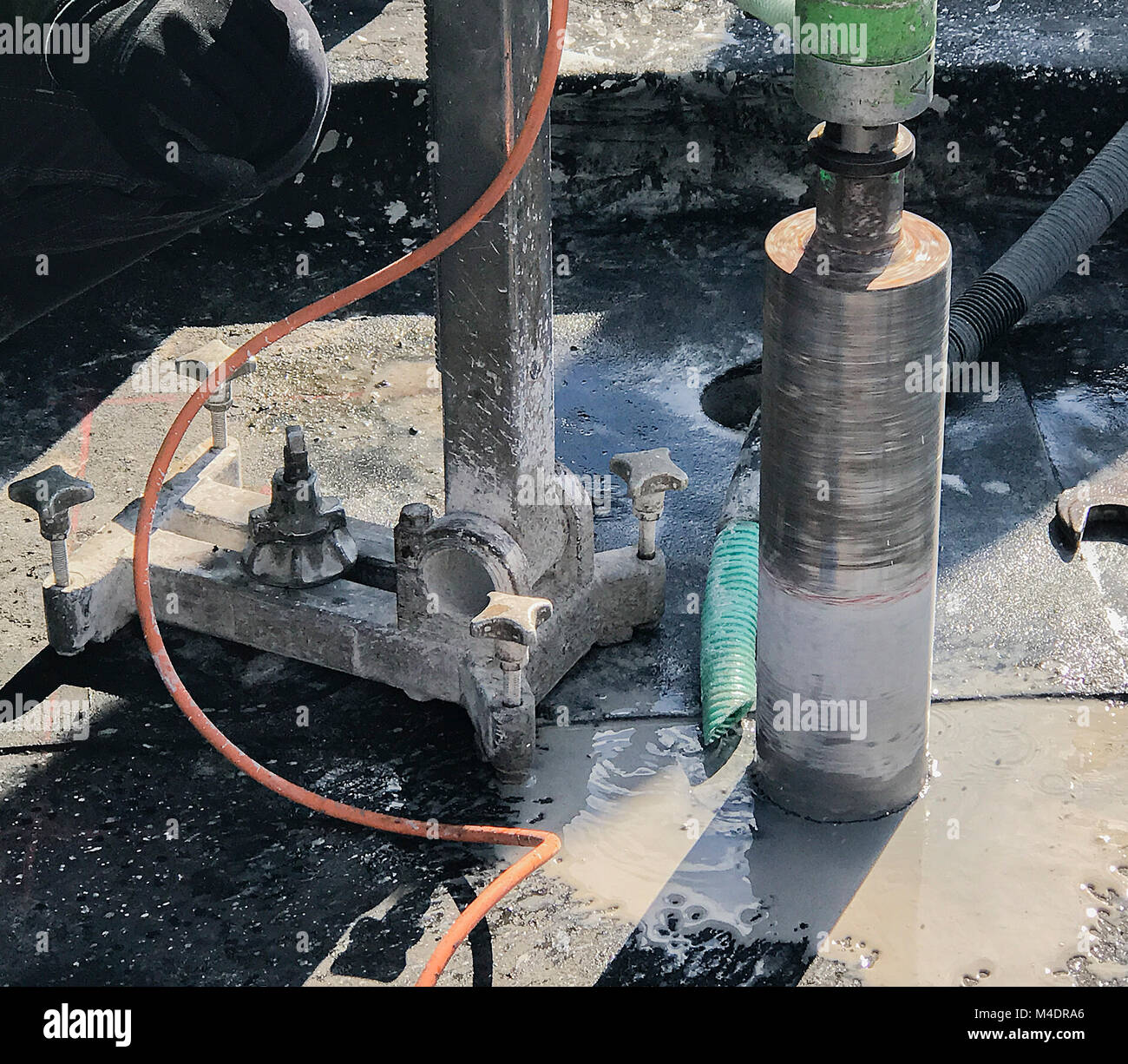 Core drilling through a building ceiling Stock Photo Alamy