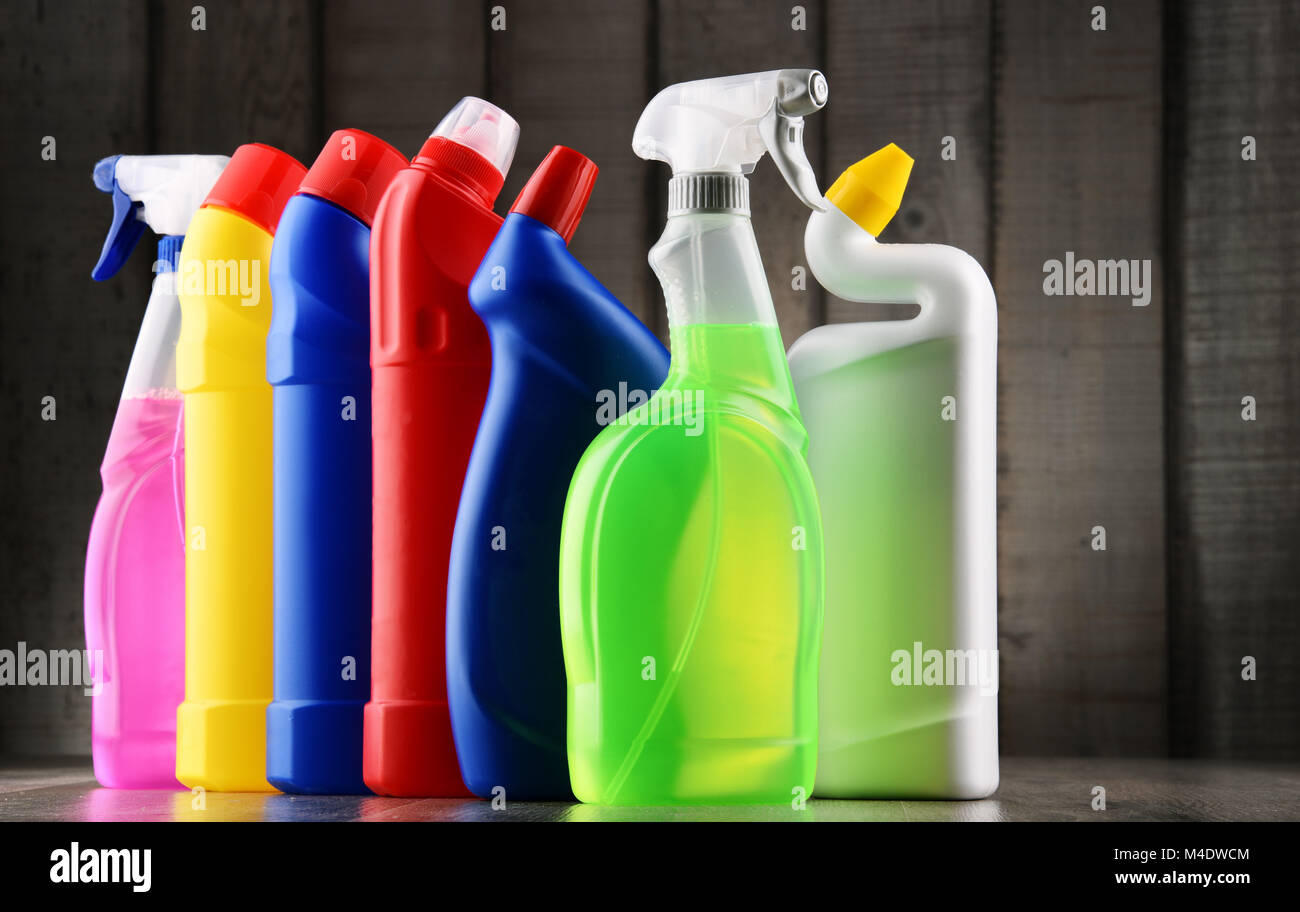 Variety of detergent bottles and chemical cleaning supplies Stock Photo