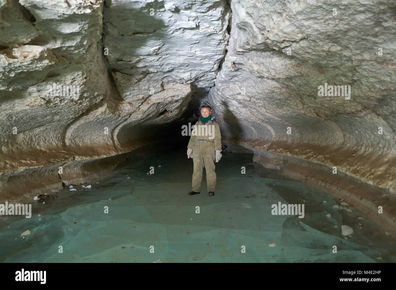 Girl speleologist Stock Photo