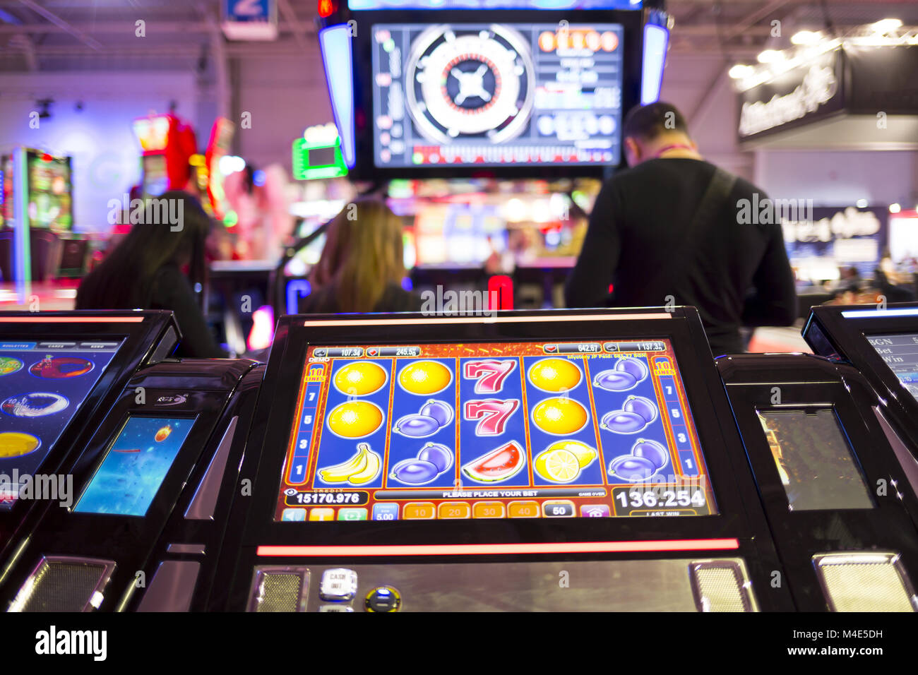 Slot Machine Player Casino slot machine players hi-res stock photography and images - Alamy