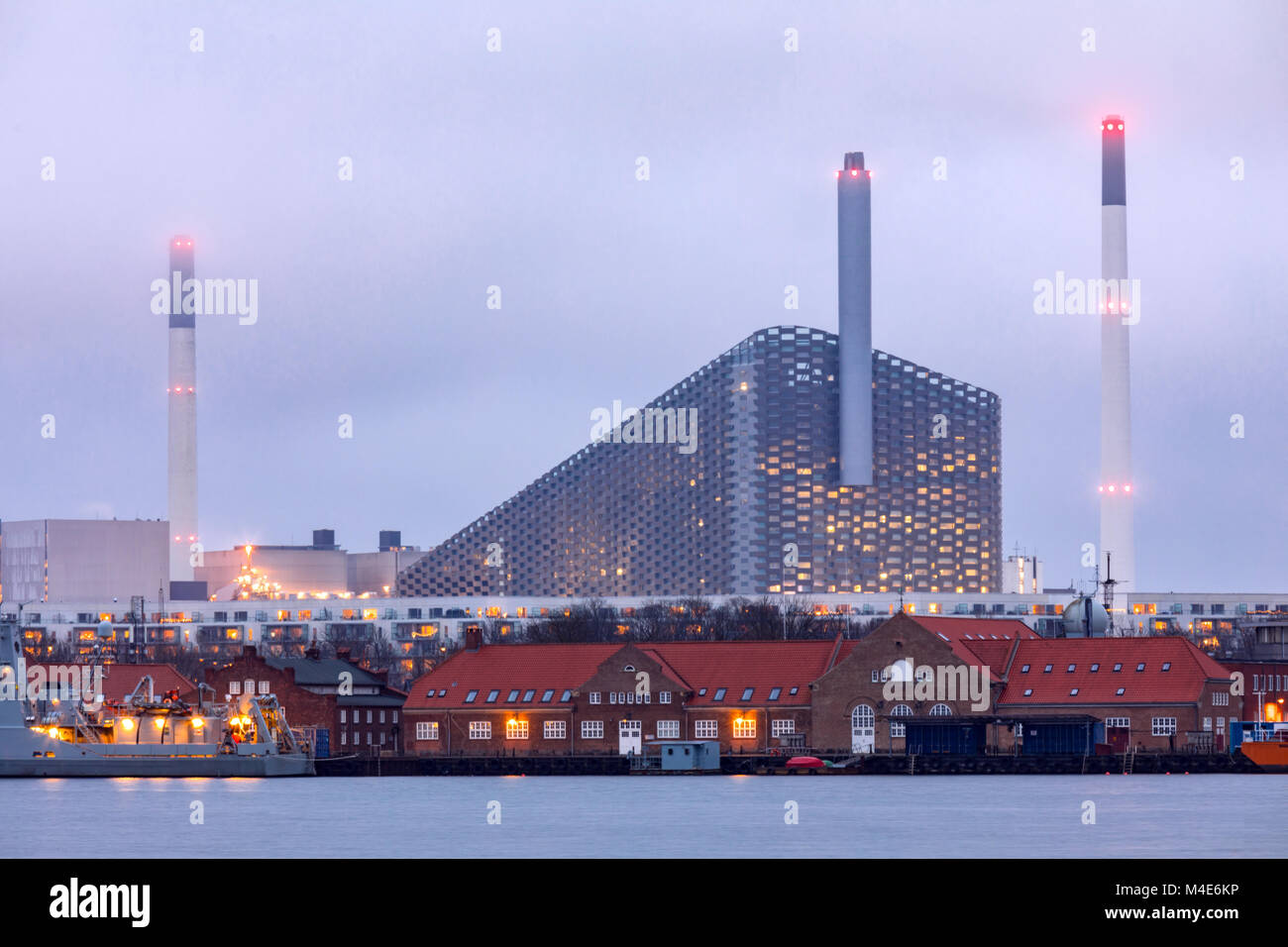 Facotry along sea Stock Photo - Alamy