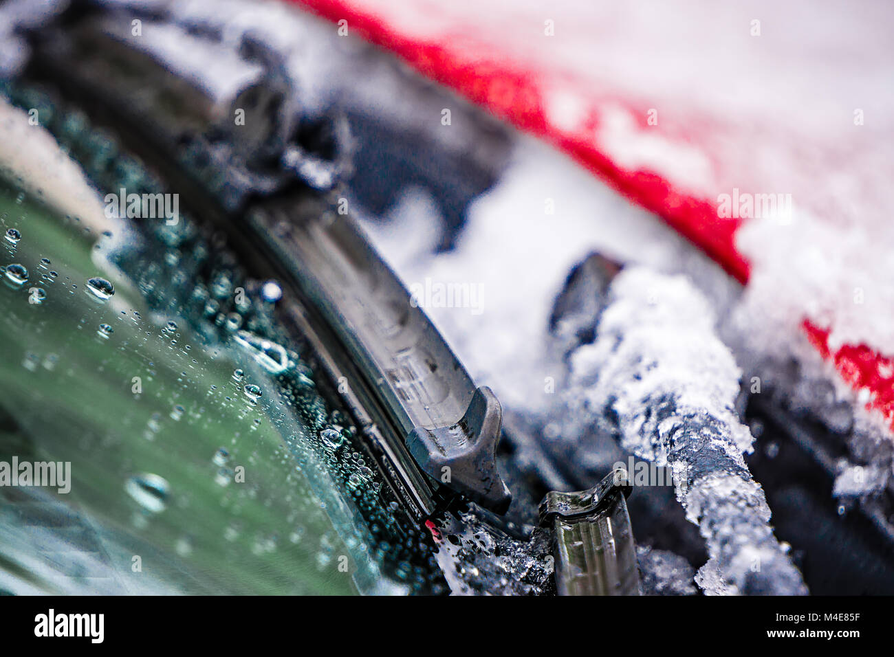 snow and ice covered windshield wipers Stock Photo Alamy