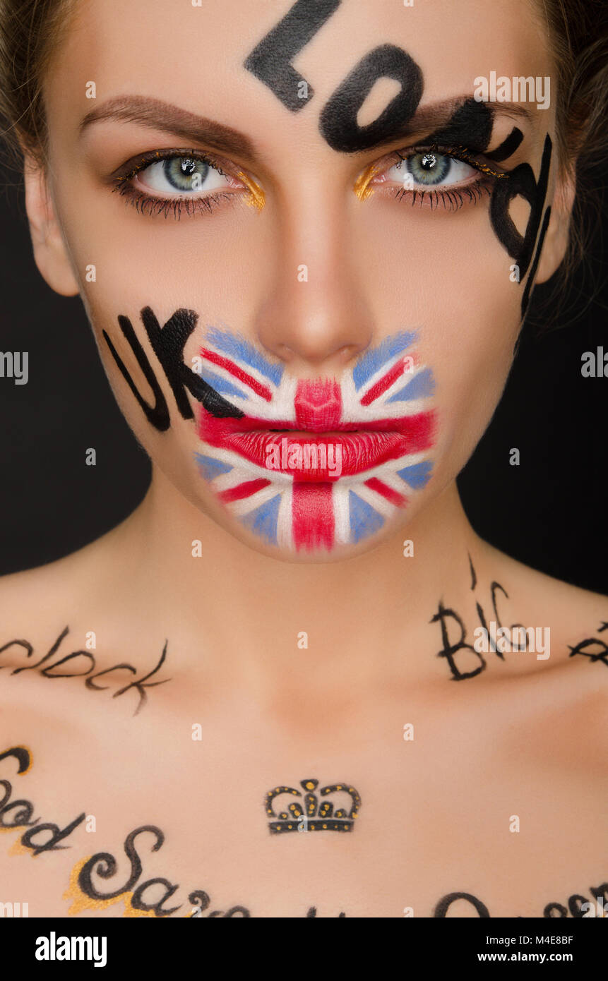 Inscriptions and flag of england on woman's face Stock Photo Alamy