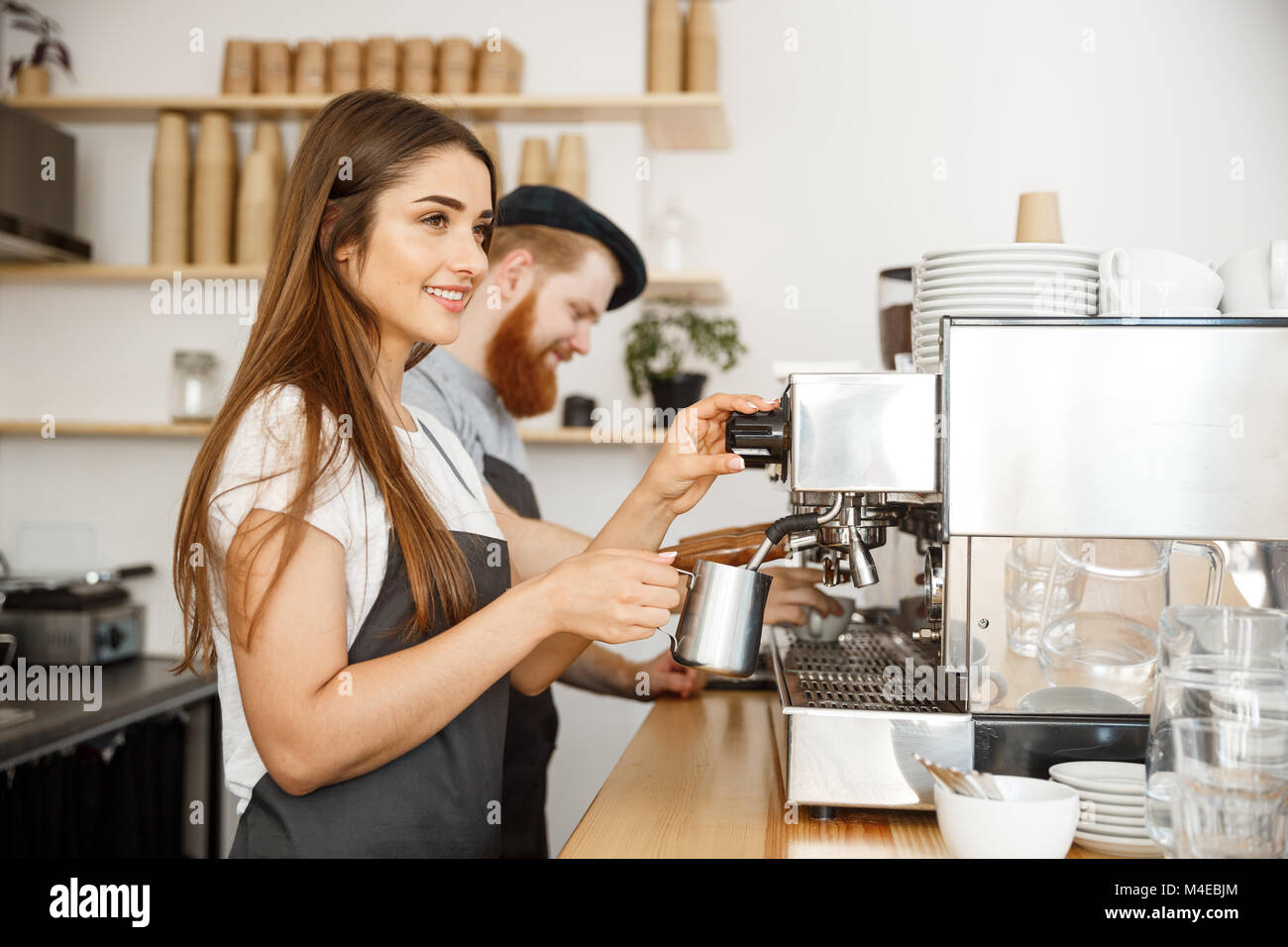 Coffee Business Concept portrait of lady barista in apron preparing