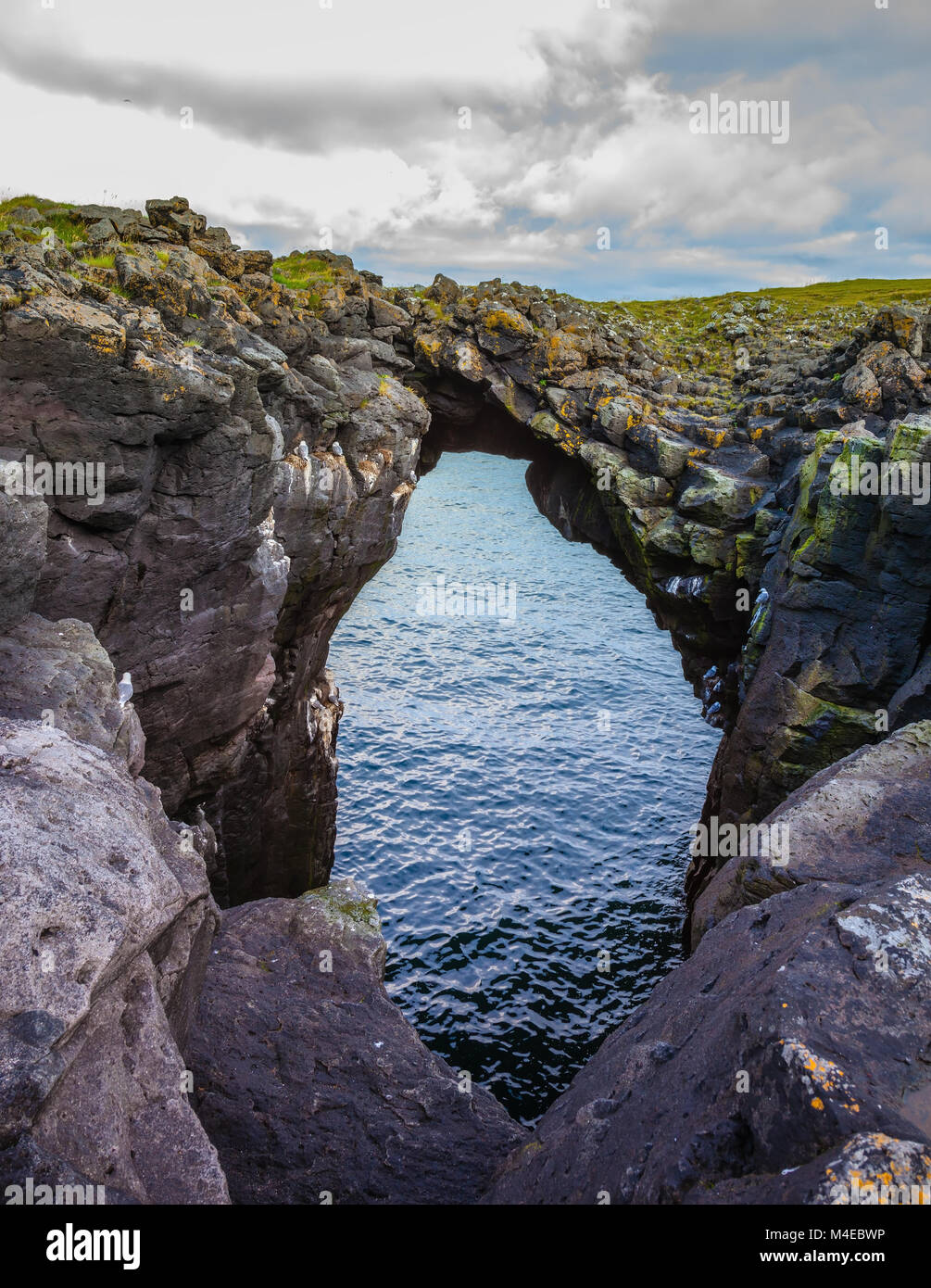 The picturesque arch in the rocks Stock Photo - Alamy