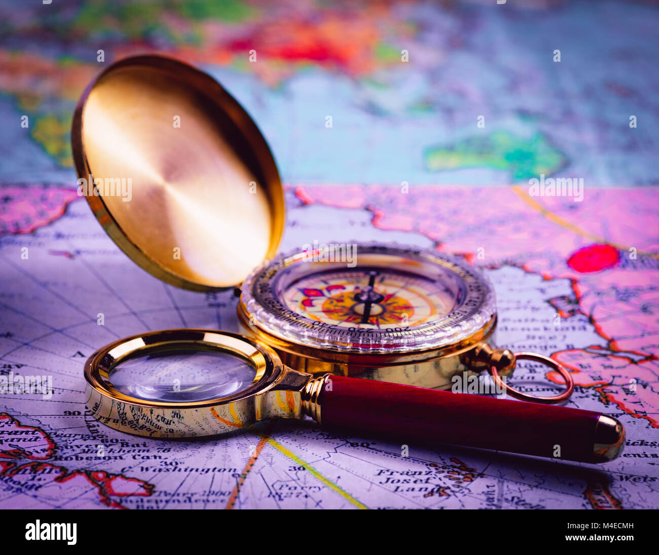 compass and magnifying glass Stock Photo Alamy