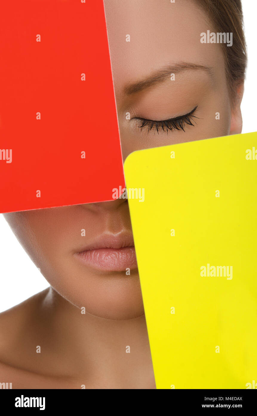 European beautiful woman with red and yellow card Stock Photo