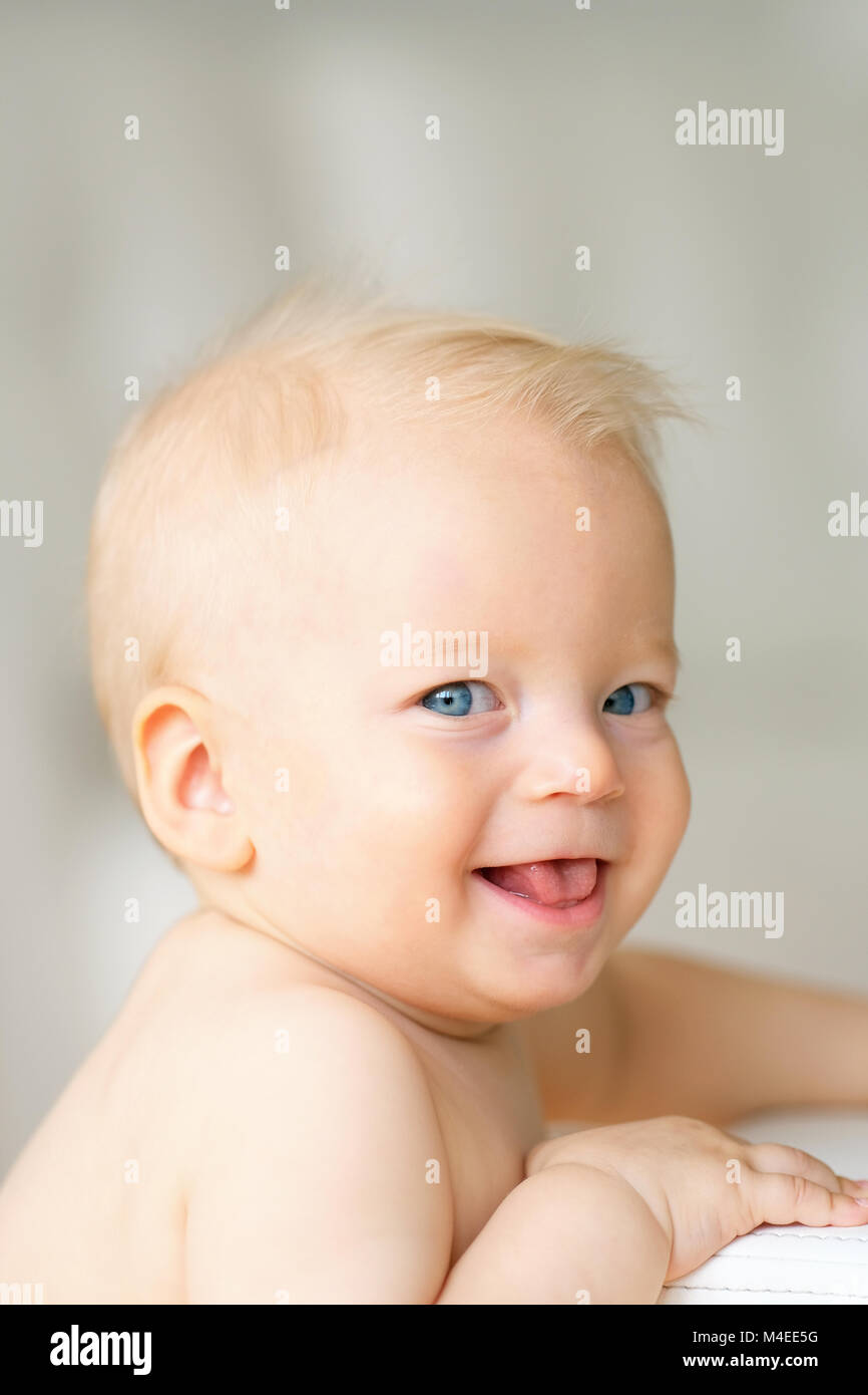 Baby boy with blue eyes Stock Photo Alamy