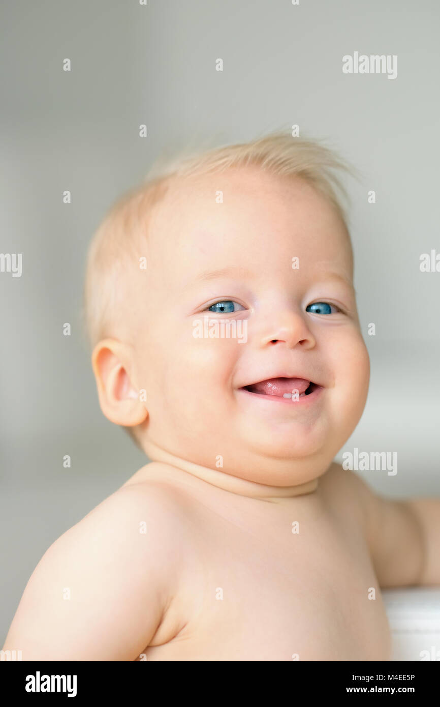 Baby boy with blue eyes Stock Photo Alamy